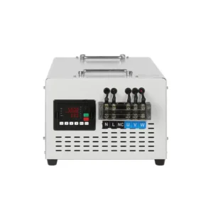 A compact, white industrial power supply or testing unit with a digital display and multiple heavy-duty connection terminals on its front panel.