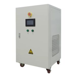 A floor-standing, light grey industrial electrical cabinet on wheels, equipped with an emergency stop button, a digital display screen, and a yellow high-voltage warning label on its front door.
